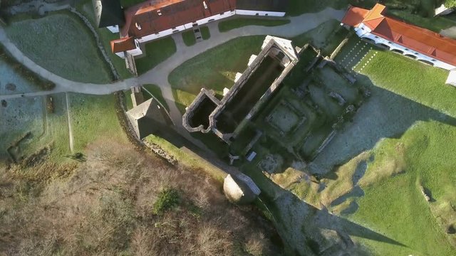 LOCE, SLOVENIA, 2019.01.25: Aerial: Ancient ruins of Zice monastery. Filming remainings of ancient French monastery on beautiful sunny winter morning.