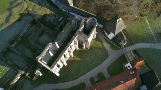 LOCE, SLOVENIA, 2019.01.25: Aerial: Ancient ruins of Zice monastery. Filming remainings of ancient French monastery on beautiful sunny winter morning.