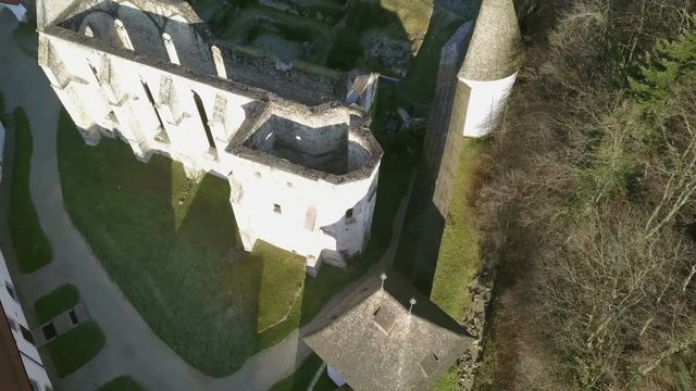LOCE, SLOVENIA, 2019.01.25: Aerial: Ancient ruins of Zice monastery. Filming remainings of ancient French monastery on beautiful sunny winter morning.