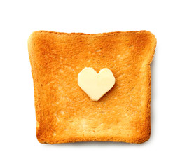 Slice of toasted bread with butter on white background
