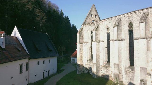 LOCE, SLOVENIA, 2019.01.25: Aerial: Ancient ruins of Zice monastery. Filming remainings of ancient French monastery on beautiful sunny winter morning.