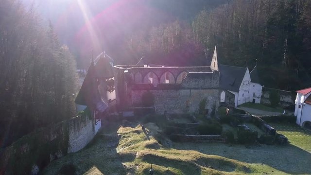 LOCE, SLOVENIA, 2019.01.25: Aerial: Ancient ruins of Zice monastery. Filming remainings of ancient French monastery on beautiful sunny winter morning.