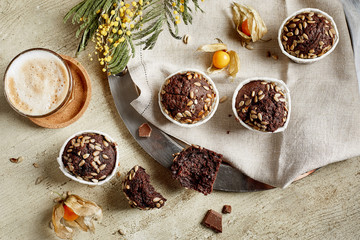 chocolate muffins on wooden table