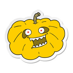 sticker of a cartoon halloween pumpkin
