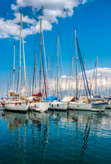 Fototapeta premium Yacht in the port of Agios Nikolaos, Crete, Greece