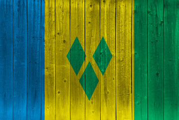 Saint Vincent and the Grenadines flag painted on old wood plank