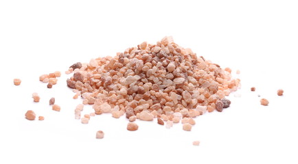 Himalayan salt grains isolated on white background