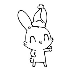 cute line drawing of a rabbit wearing santa hat