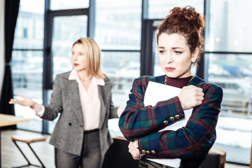 Dark-haired trainee bursting into tears after not getting the job