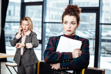 Dark-haired trainee leaving the company without job offer
