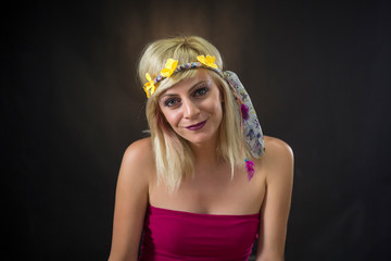 portrait of beautiful young woman wearing hippie headband