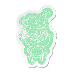 cartoon distressed sticker of a annoyed woman wearing santa hat