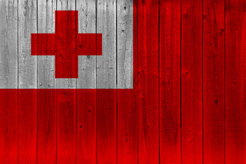 Tonga flag painted on old wood plank