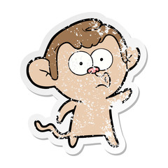Fototapeta premium distressed sticker of a cartoon hooting monkey