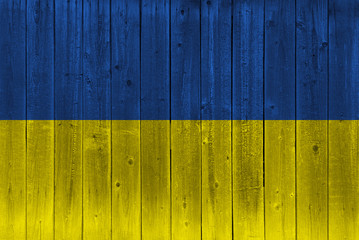 Ukraine flag painted on old wood plank