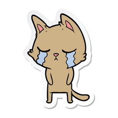 sticker of a crying cartoon cat