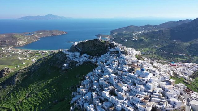 Aerial drone panoramic video of picturesque main village or chora of Serifos island with breathtaking views to the Aegean sea in spring, Cyclades islands, Greece