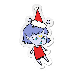 pretty sticker cartoon of a alien girl wearing santa hat