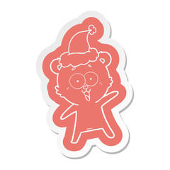 laughing teddy  bear cartoon  sticker of a wearing santa hat