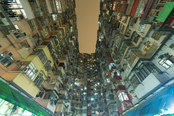 Crowded Old residential building in Hong Kong city at night