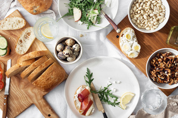 Healthy breakfast lunch snack Sandwiches prosciutto vegetables arugula salad background top view