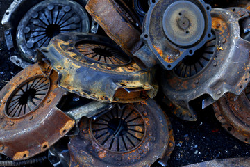 Rusty, old and broken car spare parts