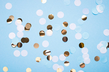 Blue festive background with white blue and gold confetti for any project. Horizontal. Copy space