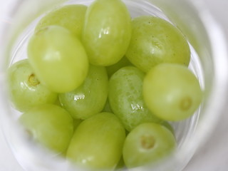 green grape on a plate