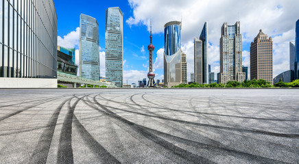 Empty asphalt square ground with panoramic city skyline in Shanghai,China