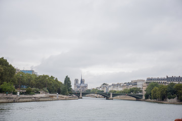 historic buildings in paris on the river seine