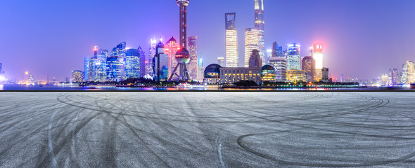 Empty asphalt square ground with panoramic city skyline in Shanghai,China
