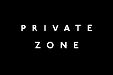 PRIVATE ZONE sign. White letters on the black background