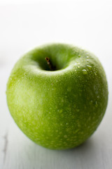 Wet green apple