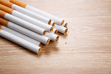 Cigarettes on a wooden background