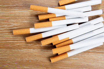 Cigarettes on a wooden background