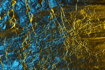 abstract background metal aluminum foil blue and yellow gold color