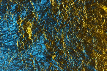 abstract background metal aluminum foil blue and yellow gold color