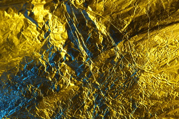 abstract background metal aluminum foil blue and yellow gold color