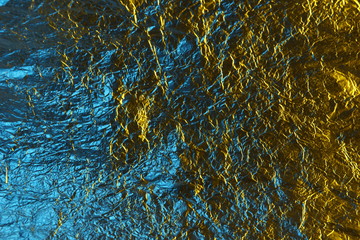 abstract background metal aluminum foil blue and yellow gold color