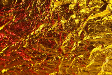 abstract background metal aluminum foil gold yellow and red colors