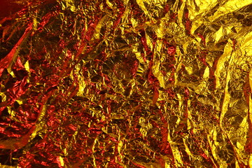 abstract background metal aluminum foil gold yellow and red colors