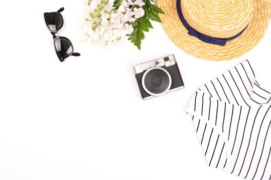 French style monochrome outfit of the day. Minimal and elegant clothes set. Flat lay, top view. Copy space for your text. Horizontal.