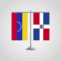 Table stand with flags of Venezuela and Dominican Republic. Two flag. Flag pole. Symbolizing the cooperation between the two countries. Table flags