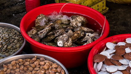 Assortament of fresh seafood. Different types of beautiful shells in the Phu Quoc market in Vietnam  for seafood restaurant
