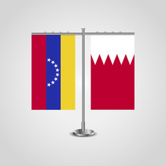 Table stand with flags of Venezuela and Bahrain. Two flag. Flag pole. Symbolizing the cooperation between the two countries. Table flags
