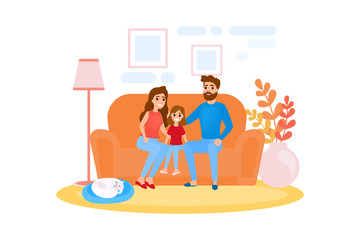 Family sitting on the couch at home. Happy