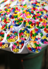 Colorful dry flowers bouquets on the florist shops at La Rambla street market, Barcelona, Spain 