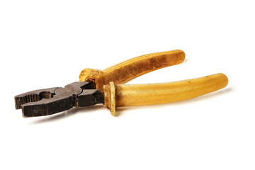 Old pliers with yellow handles isolated on white background