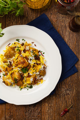 Biryani with chicken. Traditional Indian dish of rice and chicken marinated in spices and yoghurt.