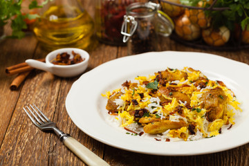 Biryani with chicken. Traditional Indian dish of rice and chicken marinated in spices and yoghurt.